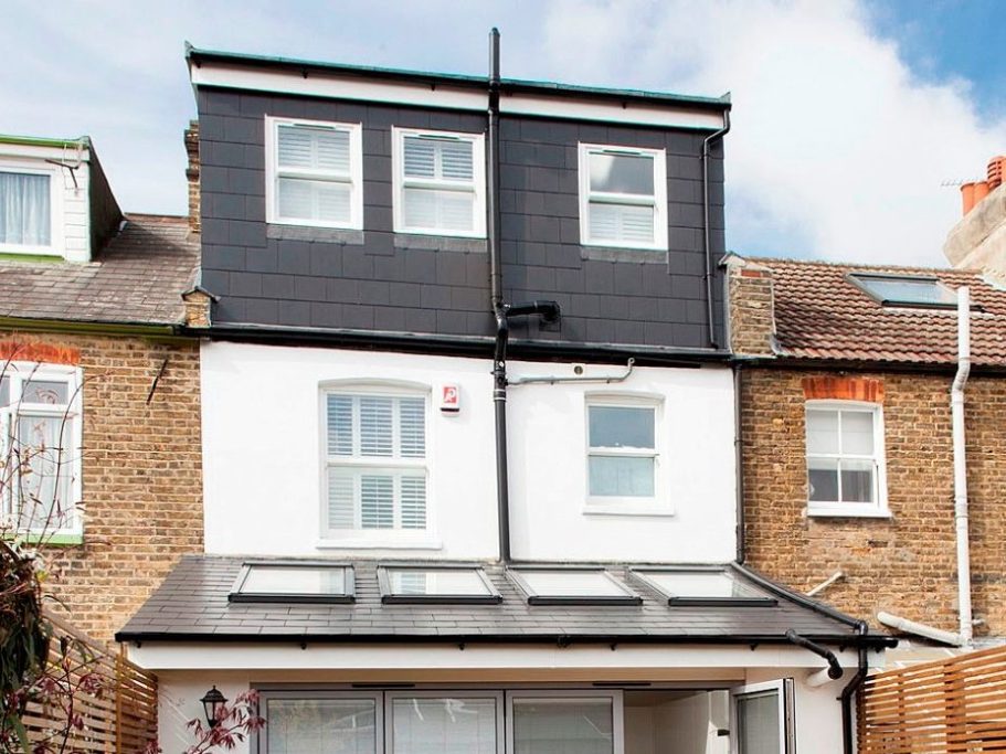 Dormer loft conversion with large windows, creating a bright and airy living space